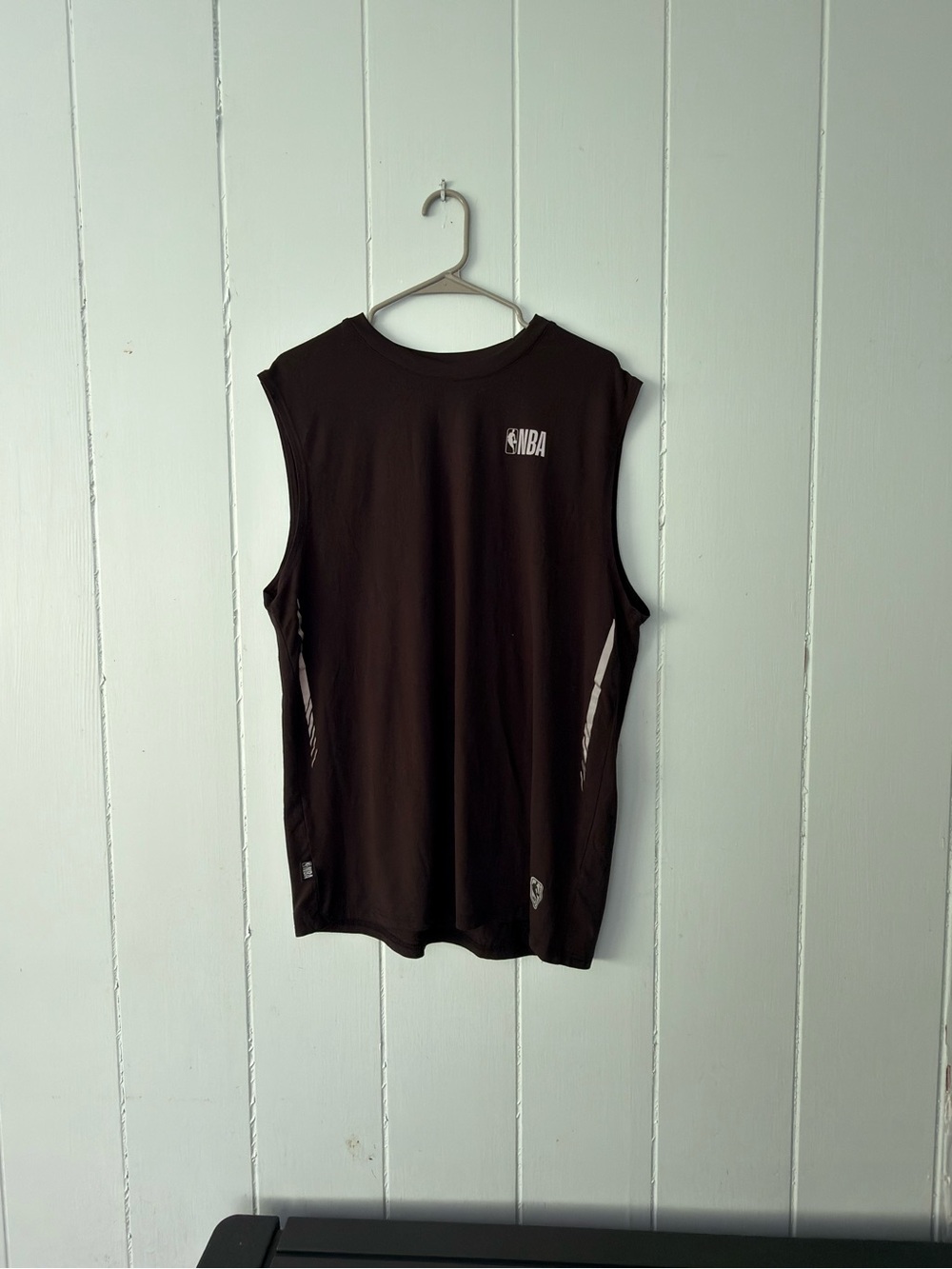 Set of 4 Sleeveless Reebok athletic shirts